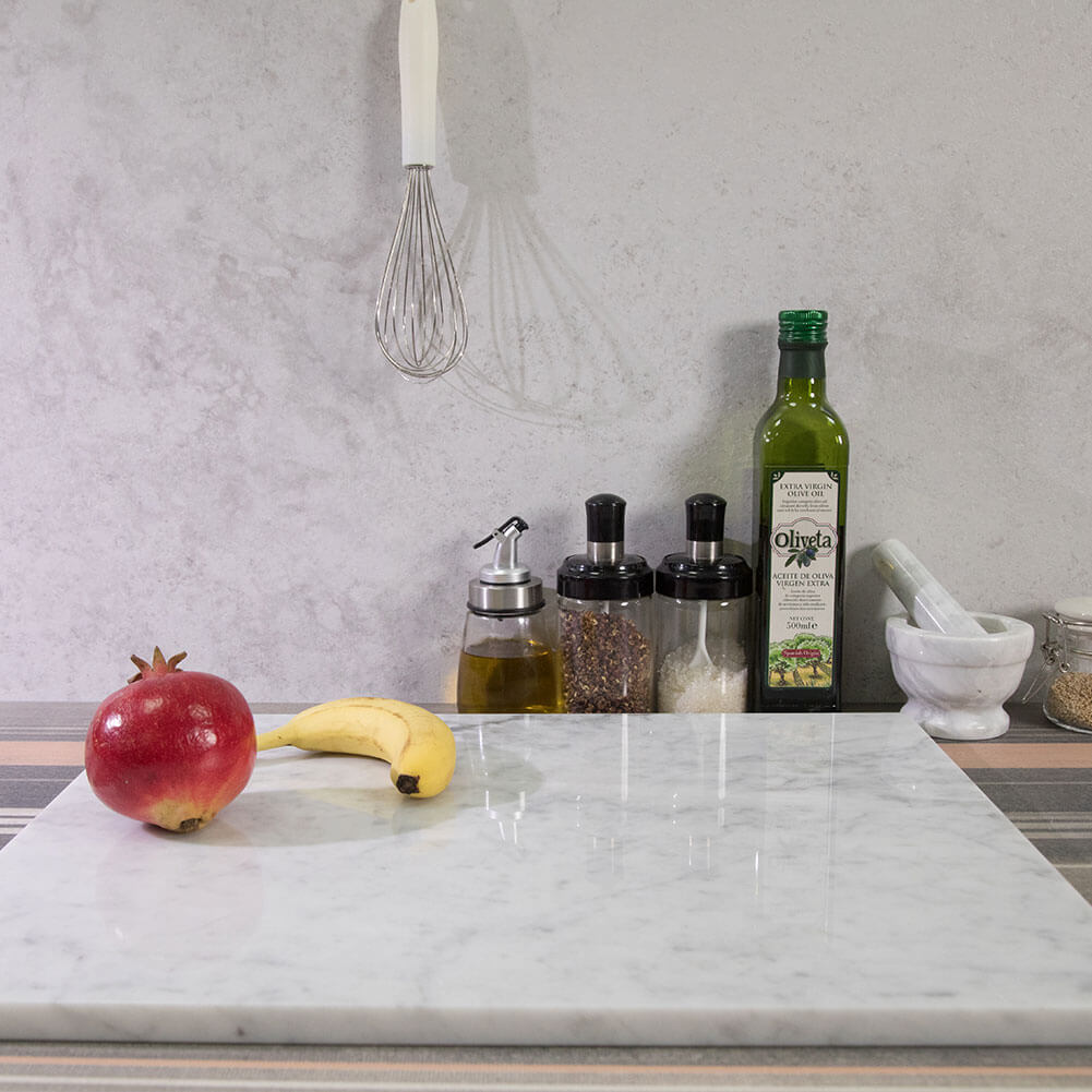 That’s my job - A White Carrara Marble chopping board with a hint of  leather - MarmoLove